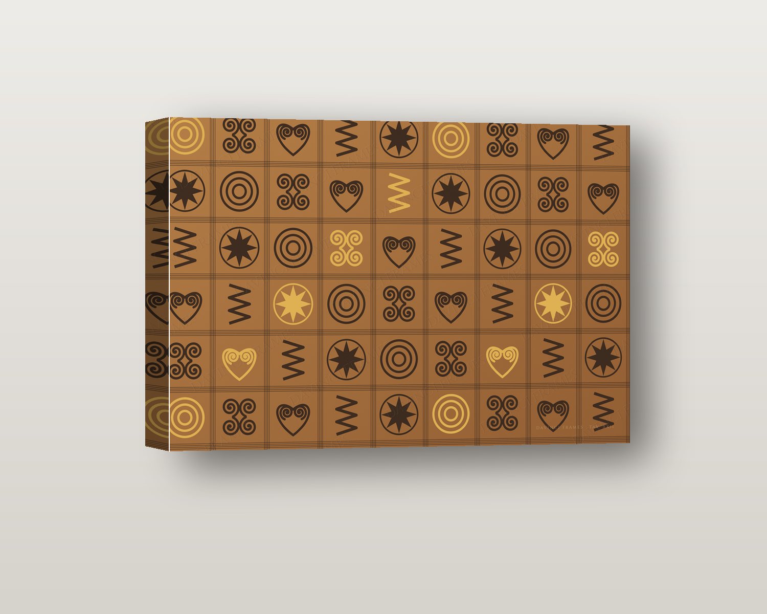 Adinkra shadow box on a wall